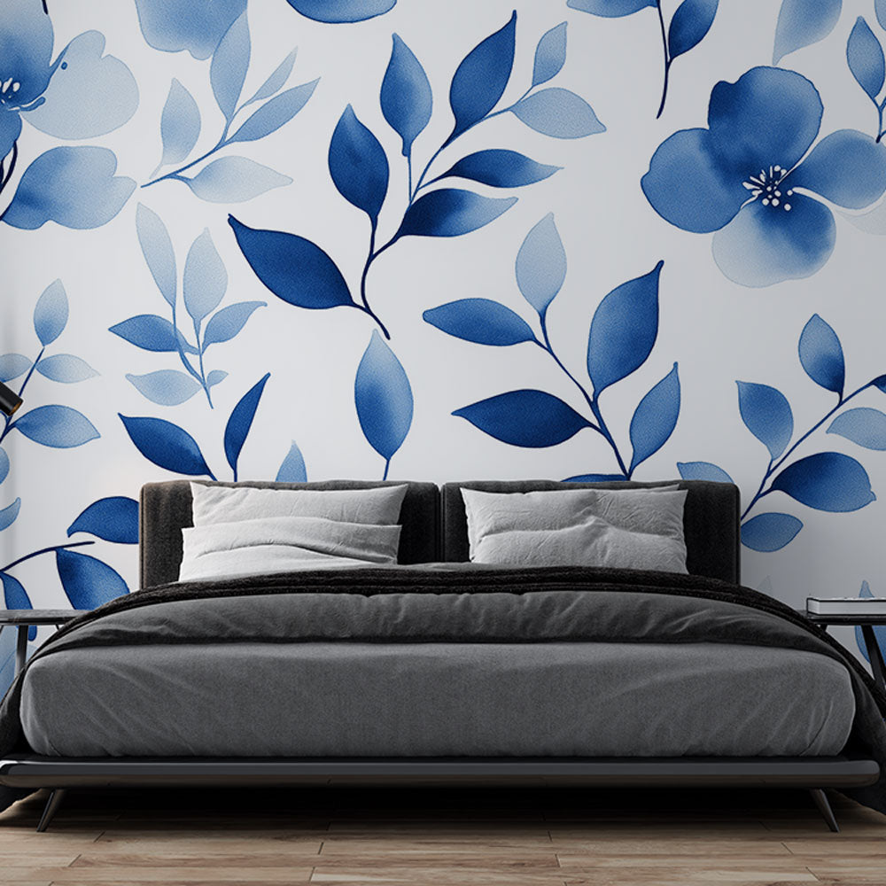 Blue watercolor leaves wallpaper mural creating a peaceful atmosphere in a modern living room with natural light