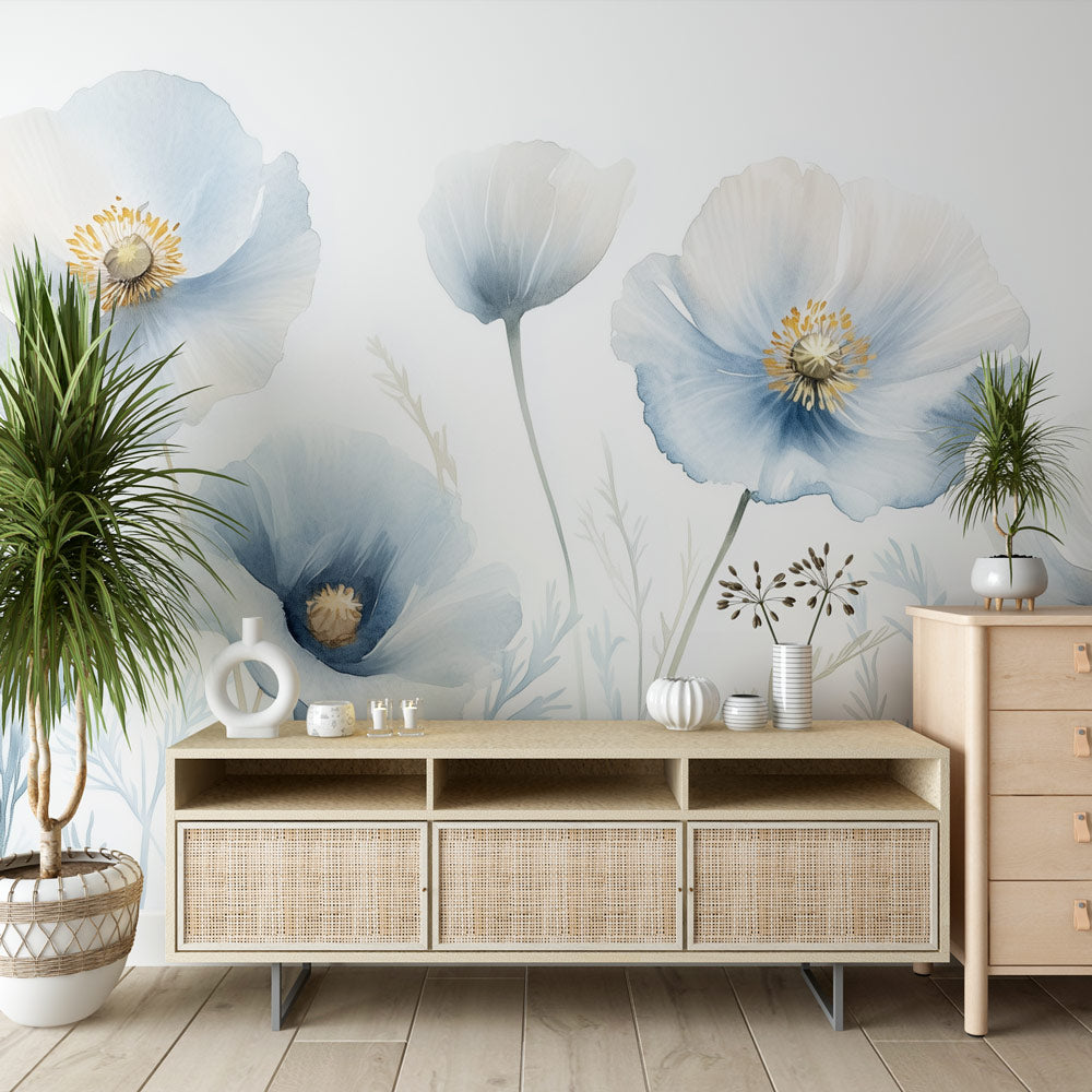 Blue watercolor poppy wallpaper creating a serene atmosphere in a bright modern bedroom with minimal furniture