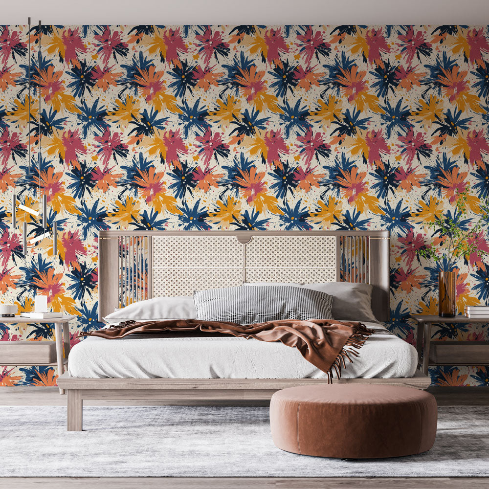 Navy and coral watercolor floral wallpaper brightening a modern living room with natural light and minimal furniture
