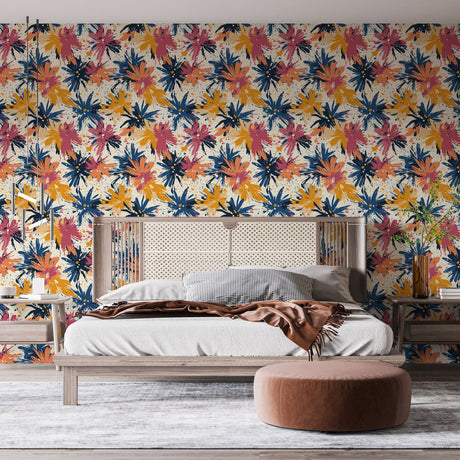 Navy and coral watercolor floral wallpaper brightening a modern living room with natural light and minimal furniture