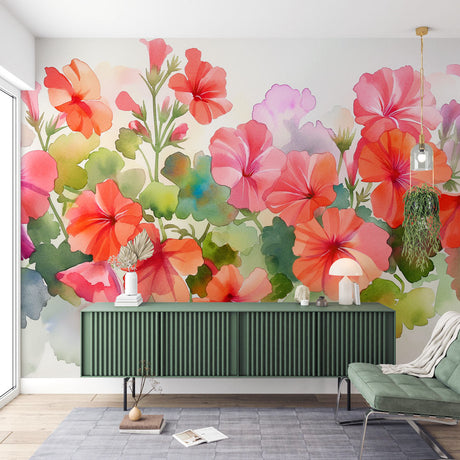 Watercolor Floral Mural displayed in bright living room, showing geranium garden pattern with soft pink and coral blooms