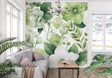 Green floral wallpaper creating a fresh look in modern living room with natural light