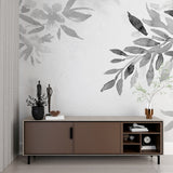 Minimalist grey floral mural enhancing a modern entryway with natural lighting