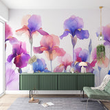 Purple and blue Iris floral wallpaper creating a soft, peaceful atmosphere in a modern living room with natural light