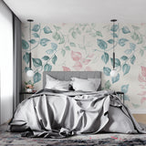 Botanical wallpaper installation in nursery with gentle pink and blue tones