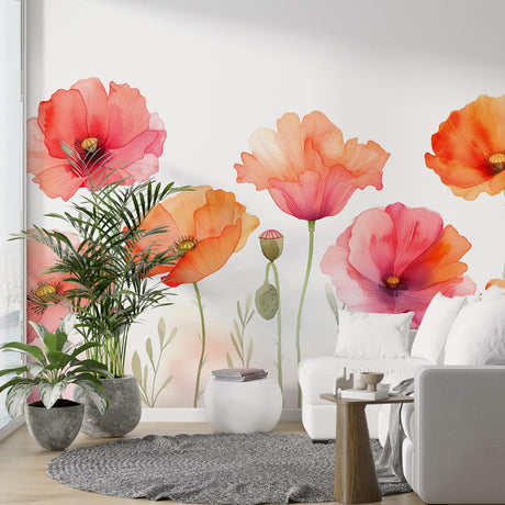 Watercolor Poppy Wallpaper creating a fresh spring mood in a bright modern living room with coral and pink floral accents
