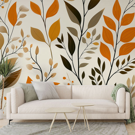 Autumn leaves wallpaper mural creating a cozy atmosphere in a modern living room with soft lighting and minimal furniture