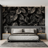 Black and silver foliage wallpaper adding elegance to a home office