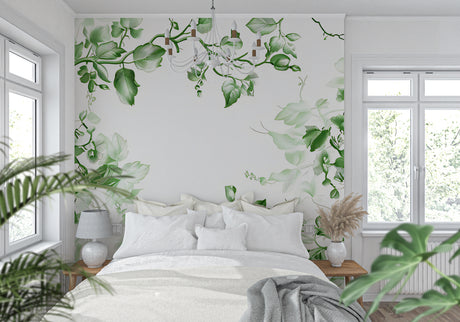Green botanical wallpaper in bright modern living room showing flowing leaf pattern