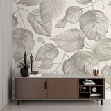 Nature-inspired grey leaf mural adding depth to home office space