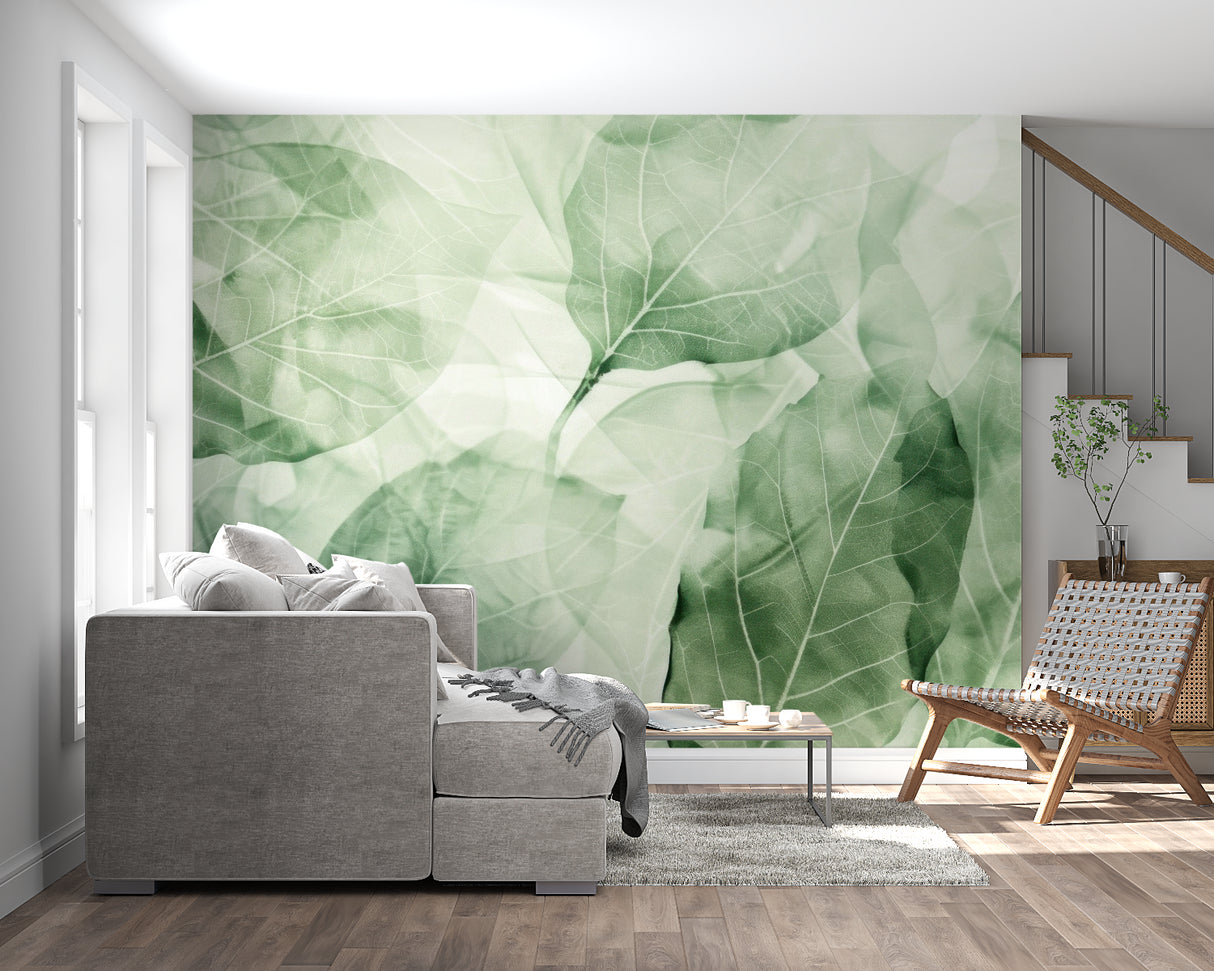 Nature-inspired wallpaper adding depth to a dining room with soft, overlapping leaf patterns