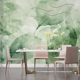 Foliage mural creating a fresh backdrop in an entrance hall, showing the scale of the leaf design