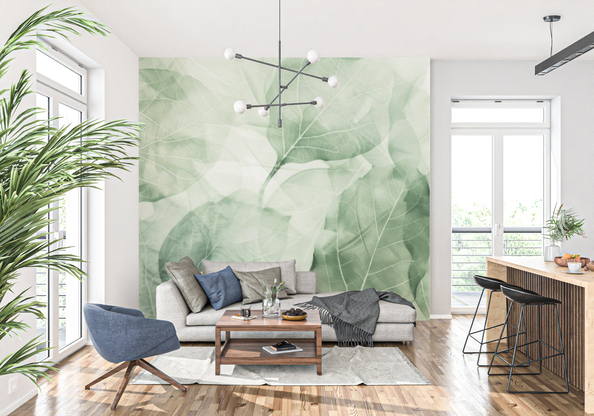 Ethereal green leaf wallpaper creating depth in an entrance hallway
