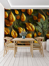 Nature-inspired gold leaf mural wallpaper in an elegant dining room with pendant lighting