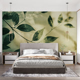 Botanical leaf wallpaper creating a serene atmosphere in a modern living room with natural light streaming through windows