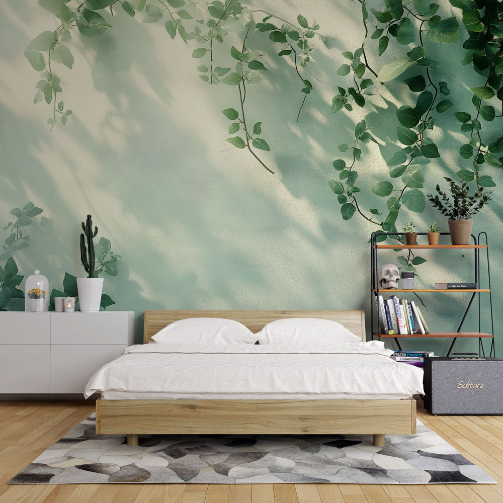 Botanical vine shadow wallpaper creating a peaceful atmosphere in a modern living room with natural light
