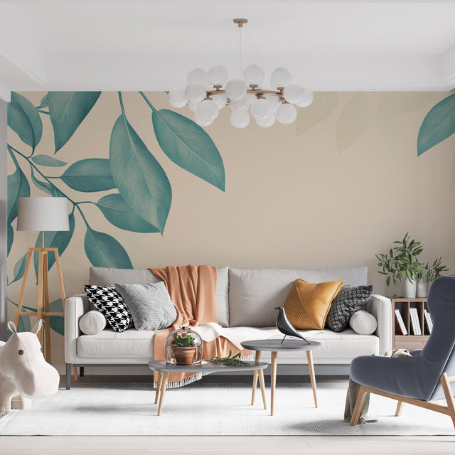 Teal leaf wallpaper mural creating a calm atmosphere in a modern living room with natural light