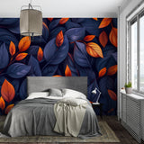 Master bedroom wall with dramatic leaf mural in navy blue and orange tones