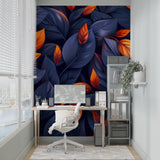 Entryway decorated with bold botanical wallpaper featuring navy and orange leaf design