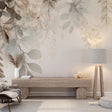 Botanical wallpaper mural in modern living room showing neutral watercolor leaves creating a peaceful atmosphere