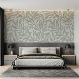 Botanical wall mural featuring sage green leaves in a stylish home office