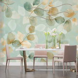 Dining room with elegant botanical wall mural in soft mint and gold