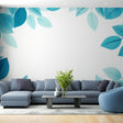 Blue leaf wallpaper mural creating a fresh atmosphere in a modern living room with natural light