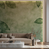 Green leaf wallpaper bringing nature indoors in cozy bedroom setting