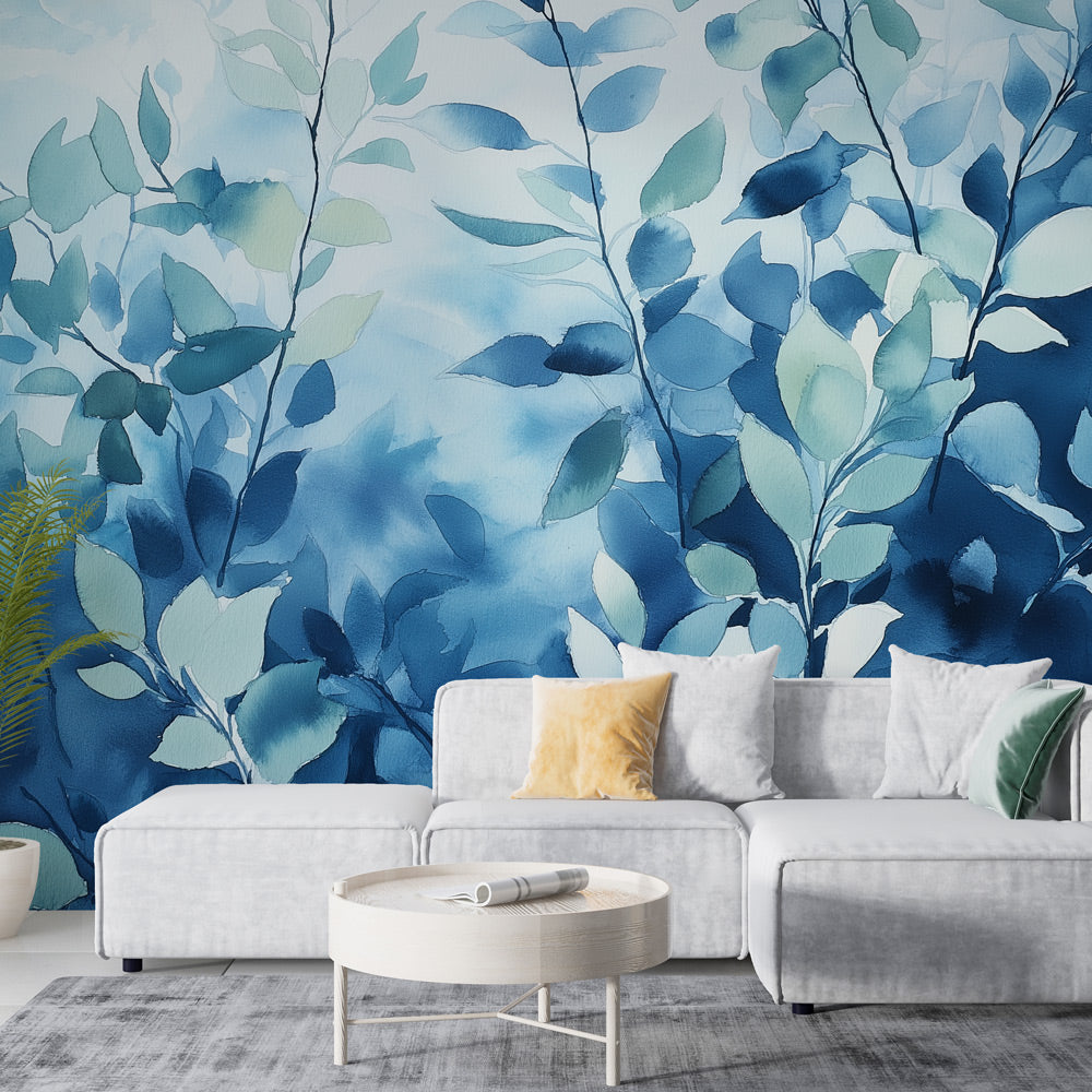 Blue watercolor foliage wallpaper creating a serene atmosphere in a modern bedroom with natural light