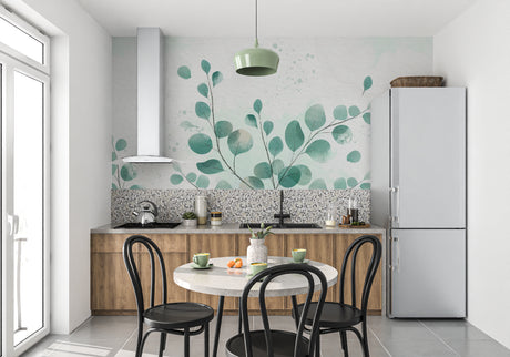 Eucalyptus leaf wallpaper in a bright modern living room showing the scale of the botanical design