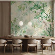 Green foliage wallpaper in bright modern living room showing watercolor branches pattern