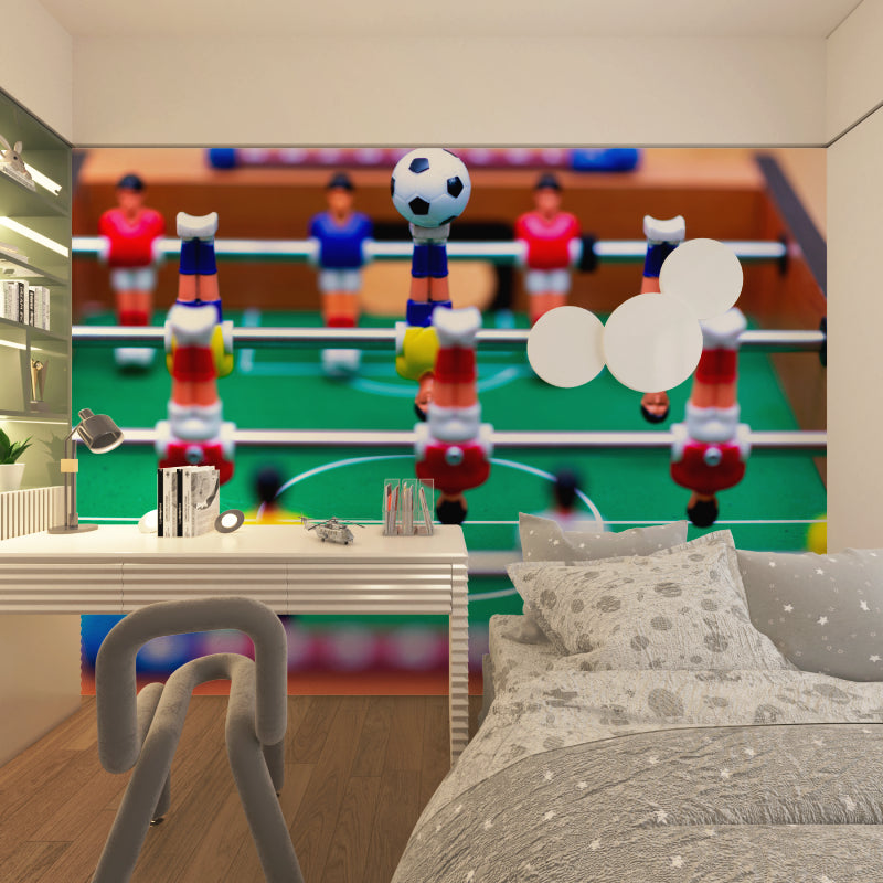 Football game mural in teen bedroom with gaming chairs and LED lighting