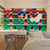 Football game mural in teen bedroom with gaming chairs and LED lighting