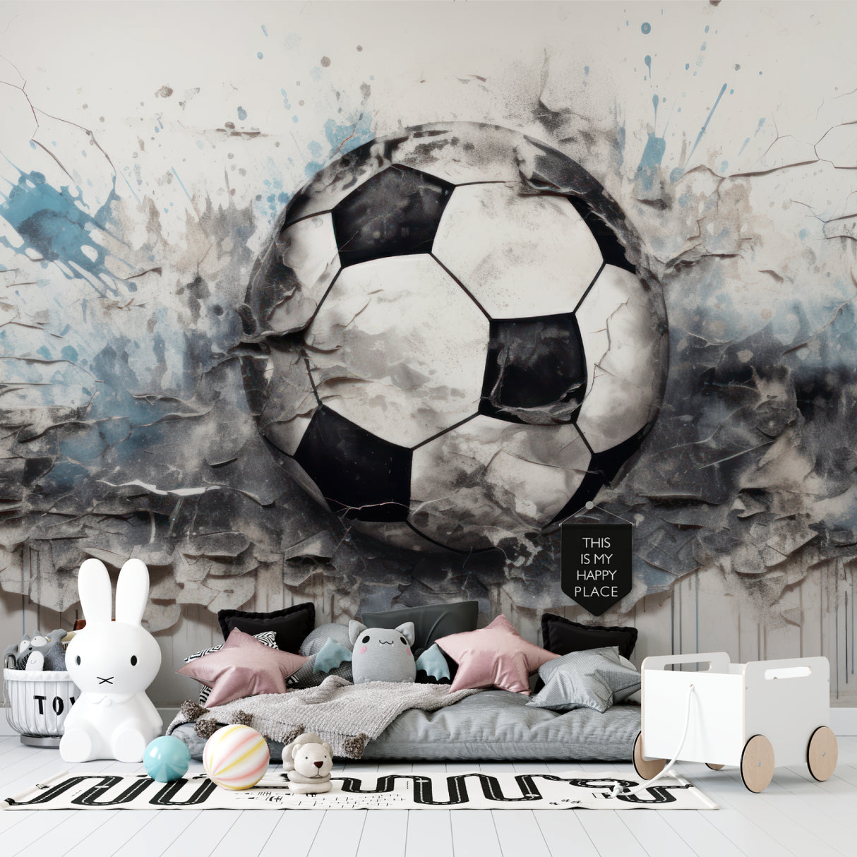 Kids room featuring football breaking through wall mural with bed setup