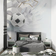 3D Football wallpaper in modern teen bedroom showing soccer ball breaking through wall effect