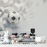 Soccer wall mural creating depth in minimalist game room with 3D breaking wall effect