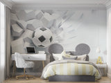 Football themed bedroom with 3D wall mural showing soccer ball breaking through effect