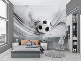 Dynamic football wall mural installed in kids playroom with sports theme