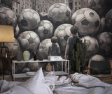 Soccer themed wallpaper transforming a game room with striking black and white design