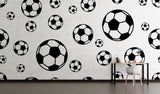 Football wallpaper mural in modern teen bedroom showing black and white soccer ball pattern creating depth