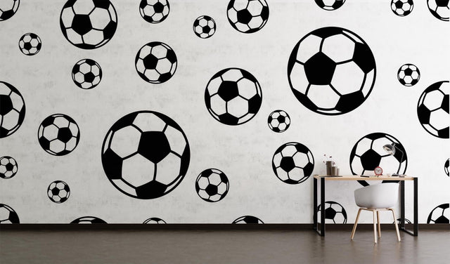 Football wallpaper mural in modern teen bedroom showing black and white soccer ball pattern creating depth