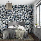 Black and white football wallpaper transforming kids playroom into sports zone