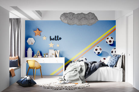 Football wallpaper in modern teen bedroom showing vibrant blue design with rainbow accents