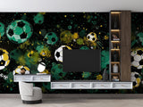 Football mural wallpaper in modern gaming room with green and gold cosmic design creating an epic atmosphere