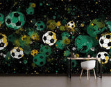Soccer themed wall mural in teen bedroom showing floating footballs in emerald and gold cosmic space