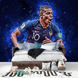 Dynamic football wall mural featured in kids playroom with sporty decor