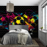 Football mural wallpaper bringing vibrant energy to a modern teen bedroom with colorful soccer design
