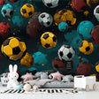 Football mural wallpaper bringing energy to a modern teen bedroom with metallic accents