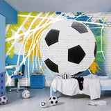 Football wall mural in modern teenage bedroom showing dynamic soccer ball design