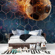 Football mural wallpaper creating sporty atmosphere in modern teen bedroom with gaming setup